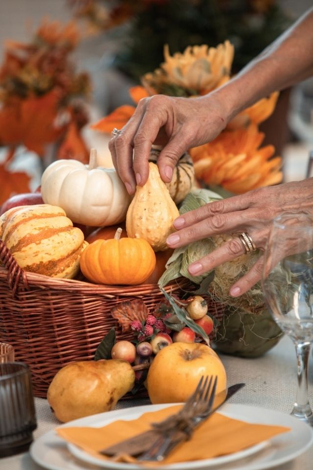 Pumpkins in basket for Thanksgiving decor 